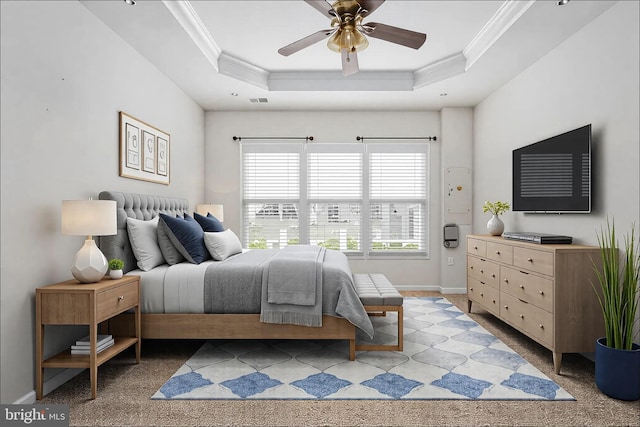 bedroom with a tray ceiling, crown molding, visible vents, a ceiling fan, and baseboards