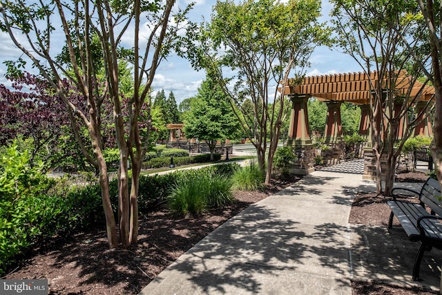 surrounding community with a pergola