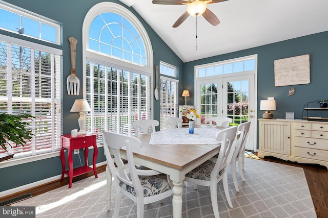 dining room with visible vents, wood finished floors, and plenty of natural light