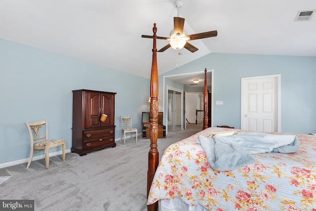 bedroom featuring light colored carpet, baseboards, visible vents, a ceiling fan, and lofted ceiling
