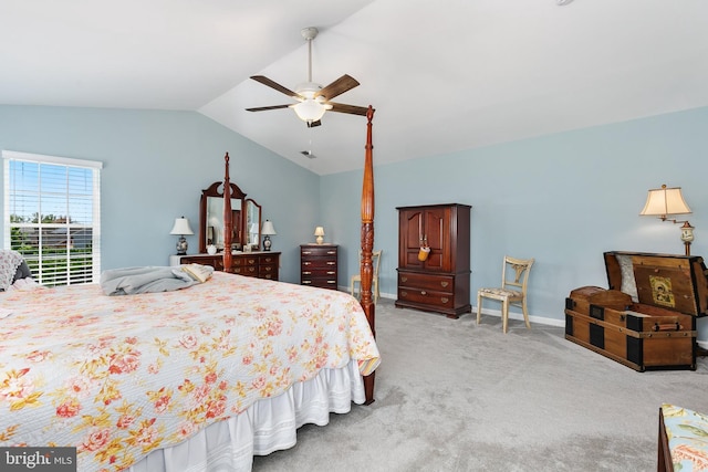 bedroom featuring light colored carpet, a ceiling fan, lofted ceiling, and baseboards