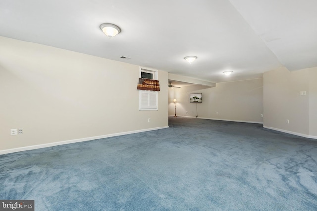 finished below grade area with baseboards and carpet