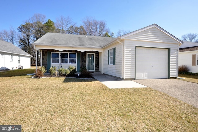 ranch-style house featuring driveway, an attached garage, and a front lawn