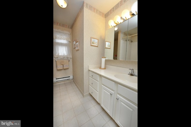 full bath with vanity, baseboards, wallpapered walls, a shower, and a baseboard heating unit