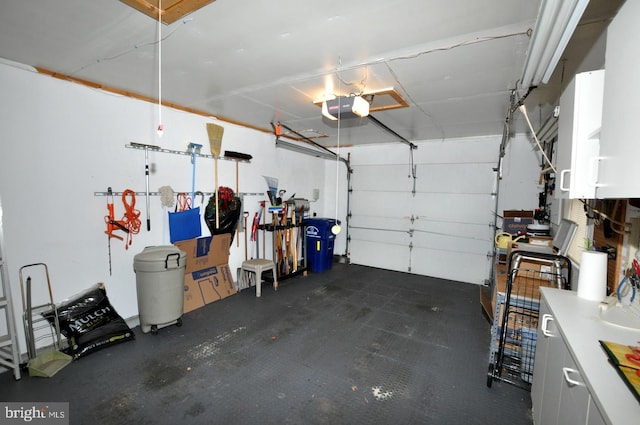 garage featuring a garage door opener