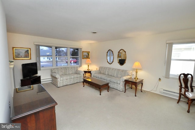 living room featuring carpet, visible vents, and baseboard heating