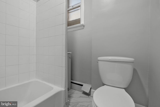 full bathroom with baseboards, marble finish floor, toilet, and a tub