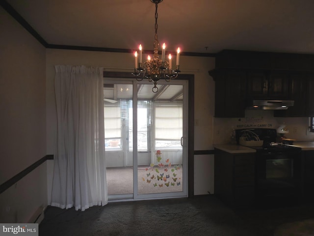 kitchen featuring range with electric stovetop, a notable chandelier, light countertops, dark carpet, and under cabinet range hood