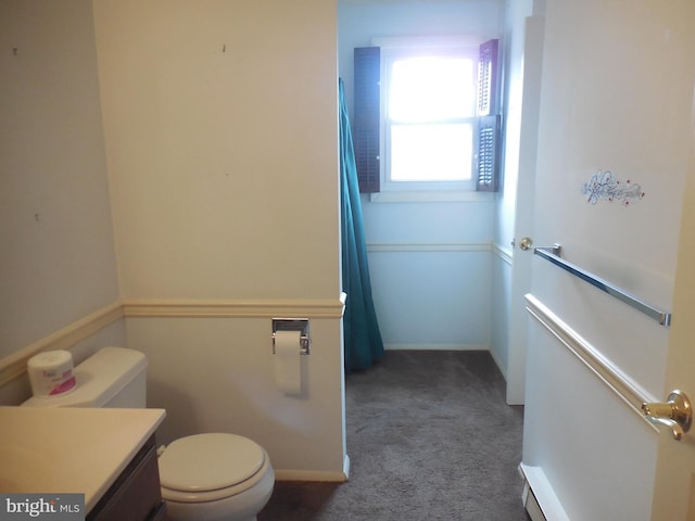 full bath with a shower with curtain, toilet, and baseboards