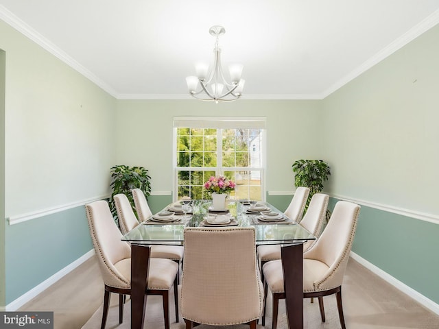 dining room featuring baseboards, light colored carpet, a chandelier, and ornamental molding