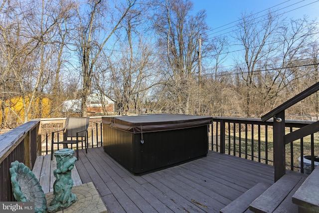 deck featuring a hot tub