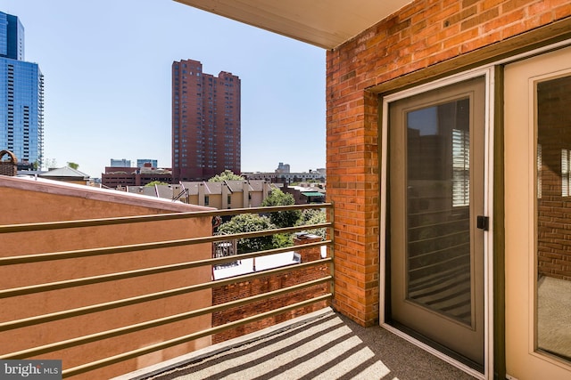 balcony featuring a view of city