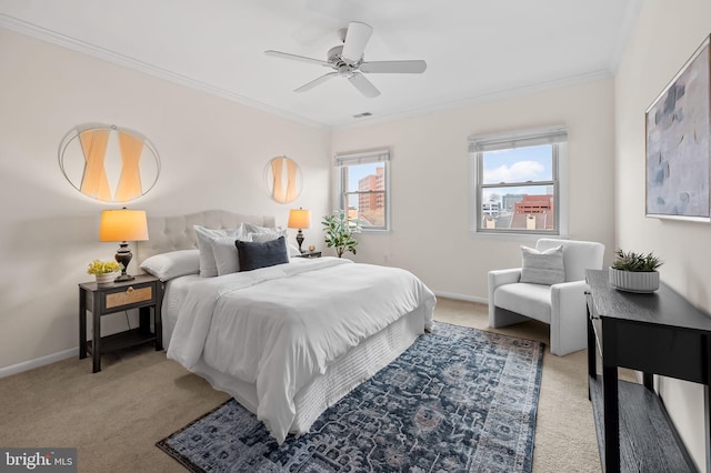 bedroom featuring visible vents, ornamental molding, light carpet, ceiling fan, and baseboards