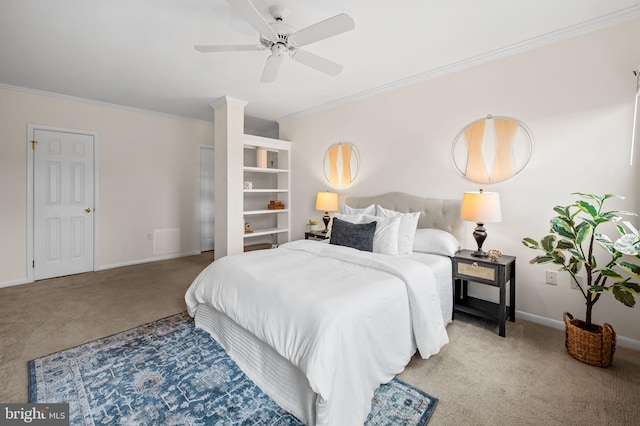 bedroom featuring carpet floors, baseboards, ornamental molding, and ceiling fan