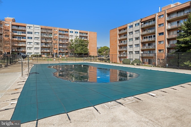 view of pool with fence