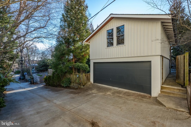 garage with fence