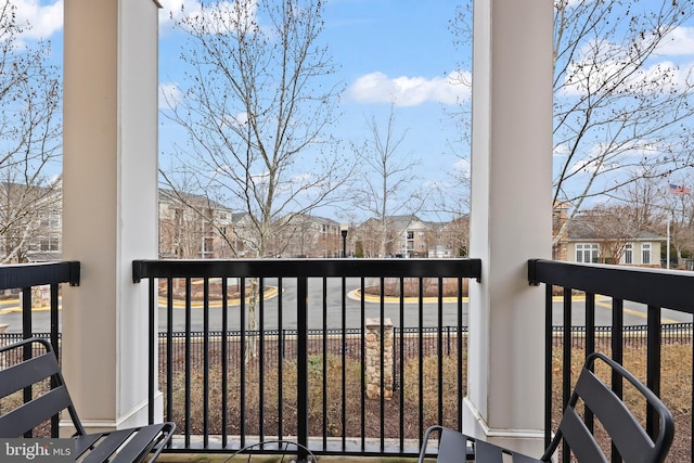 balcony featuring a residential view