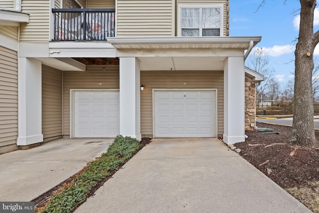 garage featuring driveway