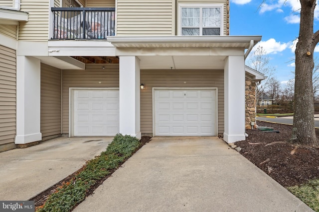 garage featuring driveway