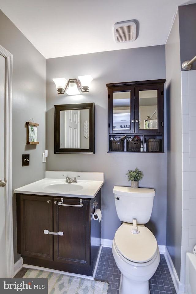 full bath featuring toilet, tile patterned floors, visible vents, and vanity