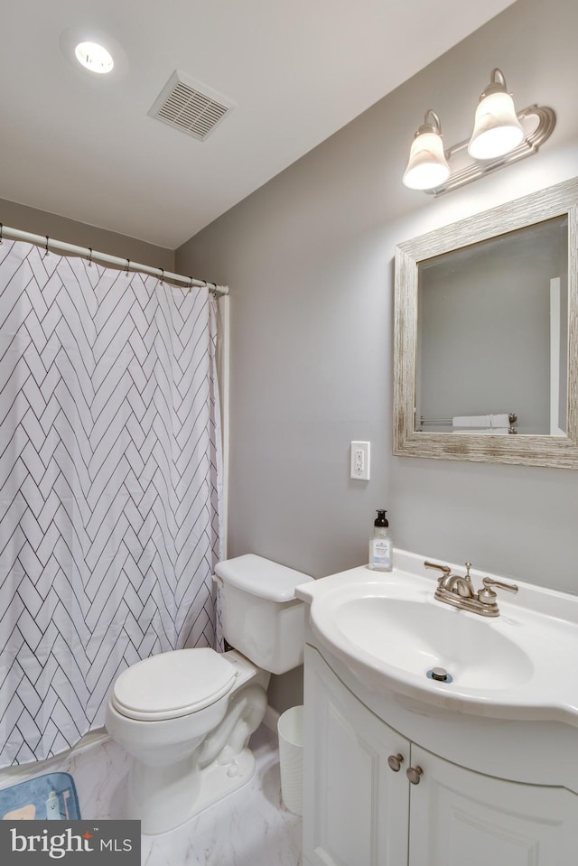 bathroom with toilet, a shower with shower curtain, vanity, visible vents, and marble finish floor