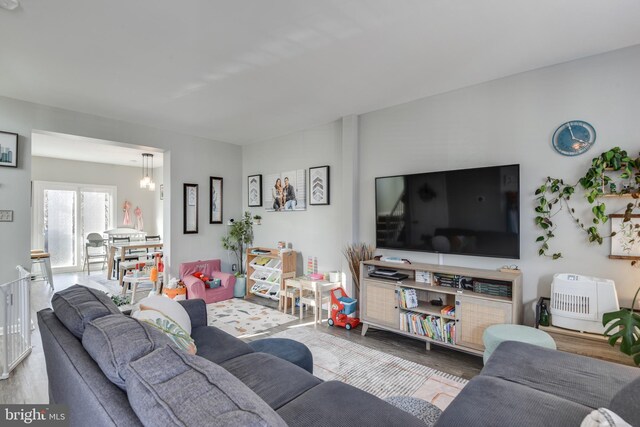 living area with wood finished floors