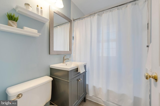 full bath with toilet, vanity, and shower / bathtub combination with curtain