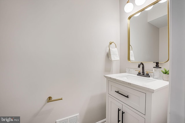 bathroom with visible vents and vanity