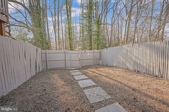 view of yard featuring a fenced backyard