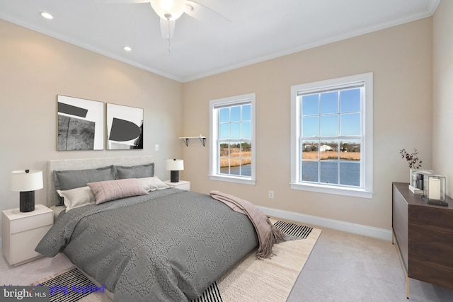 carpeted bedroom featuring recessed lighting, visible vents, baseboards, and ornamental molding