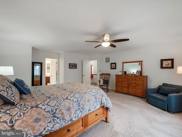 bedroom with ceiling fan, visible vents, and light colored carpet