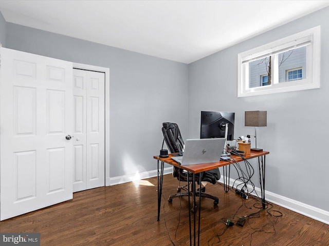 office area with baseboards and wood finished floors