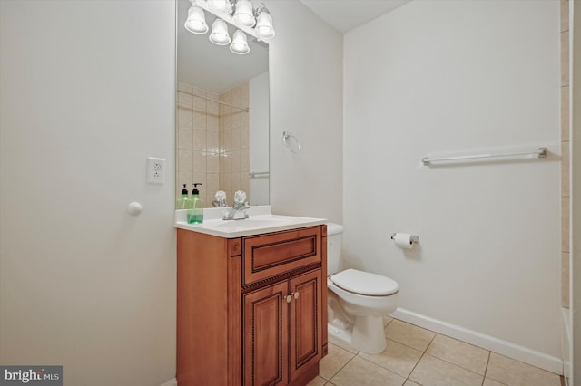 full bathroom with baseboards, vanity, toilet, and tile patterned floors