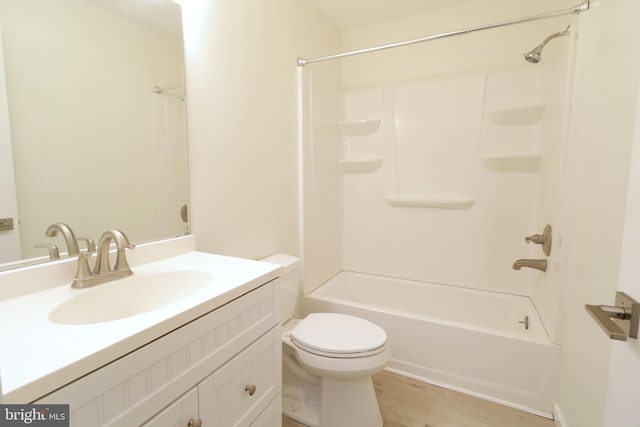 246 First Ave, State College, PA 16801 - bathroom featuring  shower combination, vanity, toilet, and wood finished floors