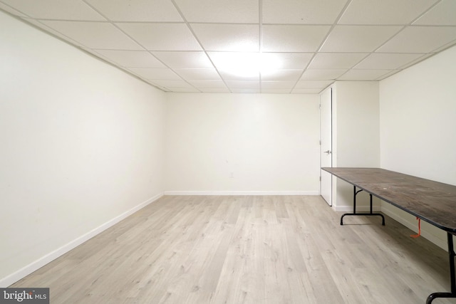 246 First Ave, State College, PA 16801 - finished below grade area with a paneled ceiling, light wood-style floors, and baseboards