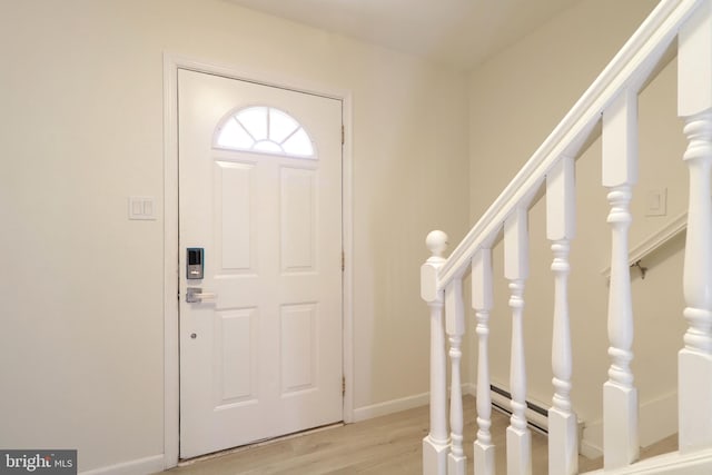246 First Ave, State College, PA 16801 - entrance foyer with light wood-type flooring, stairs, and baseboards