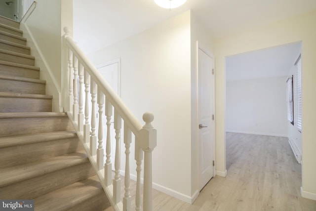 246 First Ave, State College, PA 16801 - staircase with baseboards and wood finished floors
