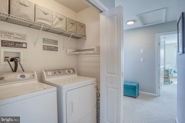 laundry area featuring laundry area, washing machine and dryer, attic access, and baseboards