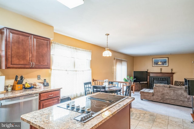 kitchen with pendant lighting, stainless steel dishwasher, black electric stovetop, open floor plan, and a center island