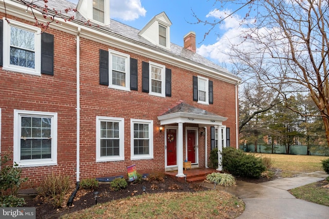 view of front of home with brick siding