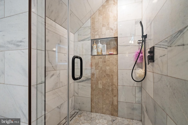 full bathroom featuring a shower stall