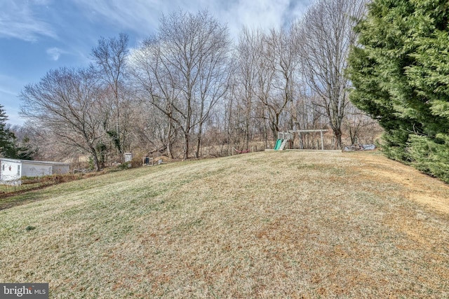 view of yard with a playground