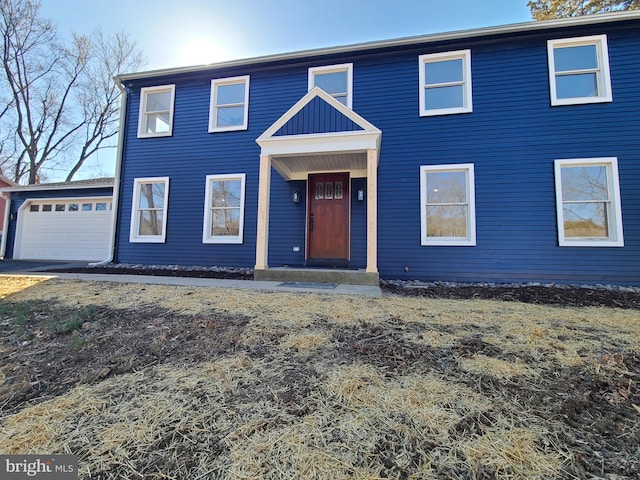 view of front of property featuring a garage