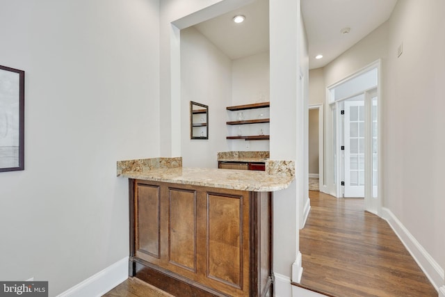 bar with baseboards, dark wood finished floors, and recessed lighting