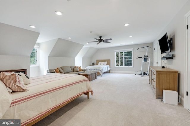 bedroom featuring lofted ceiling, recessed lighting, light colored carpet, ceiling fan, and baseboards