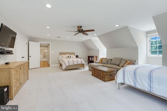 bedroom featuring recessed lighting, lofted ceiling, light colored carpet, ceiling fan, and baseboards