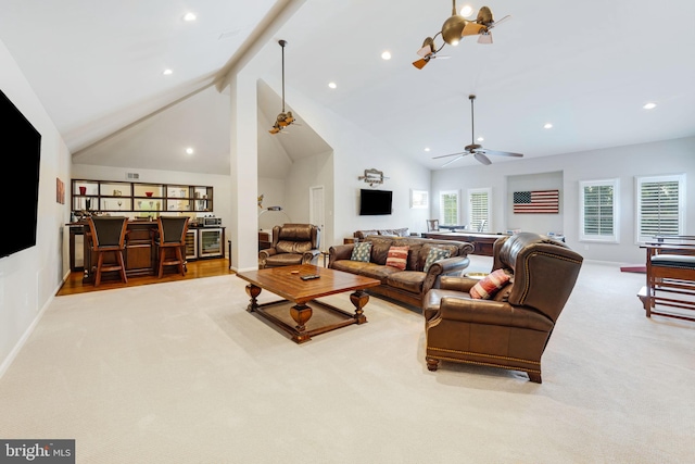 living room featuring recessed lighting, carpet flooring, ceiling fan, and beamed ceiling