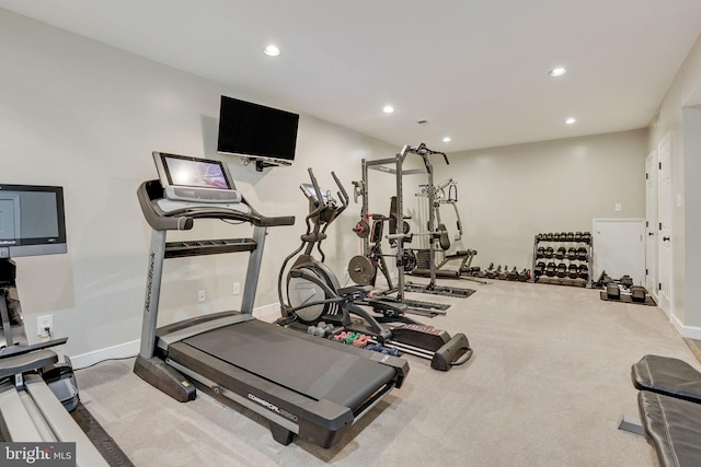 exercise area featuring baseboards, carpet flooring, and recessed lighting