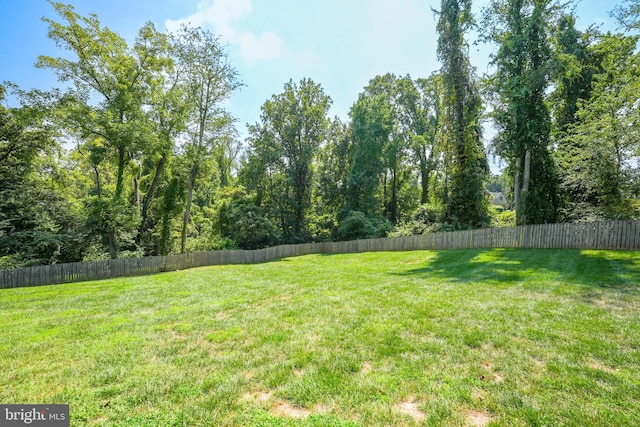 view of yard with fence