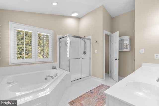 full bath featuring a stall shower, a sink, a tub with jets, tile patterned flooring, and baseboards